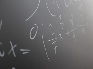 LearnOnline Fast Track Mathematics A level Self-study Chalk board with maths equations