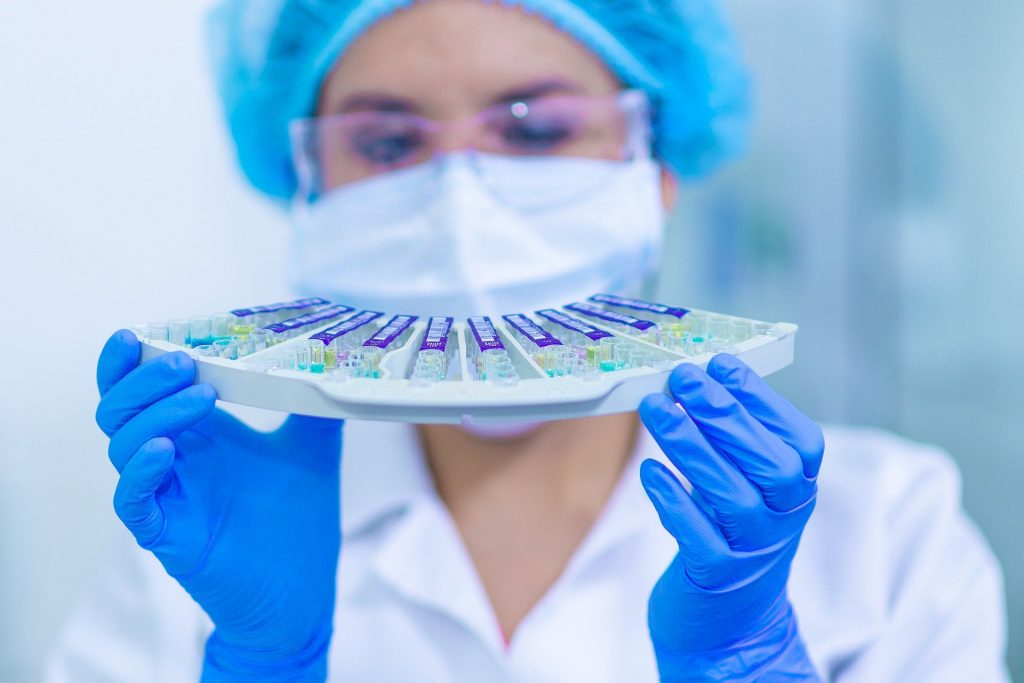 Women in STEM. Person in laboratory holding samples