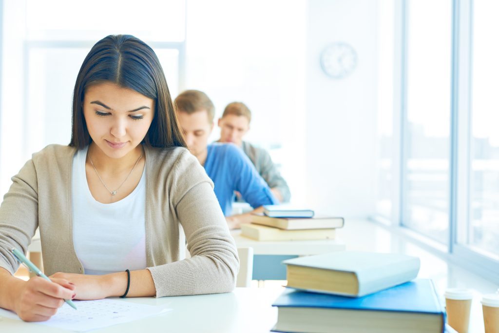 LearnOnline Exams news article Portrait of pensive student carrying out test at lesson