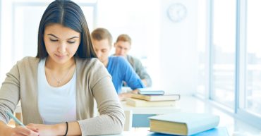 LearnOnline Exams news article Portrait of pensive student carrying out test at lesson