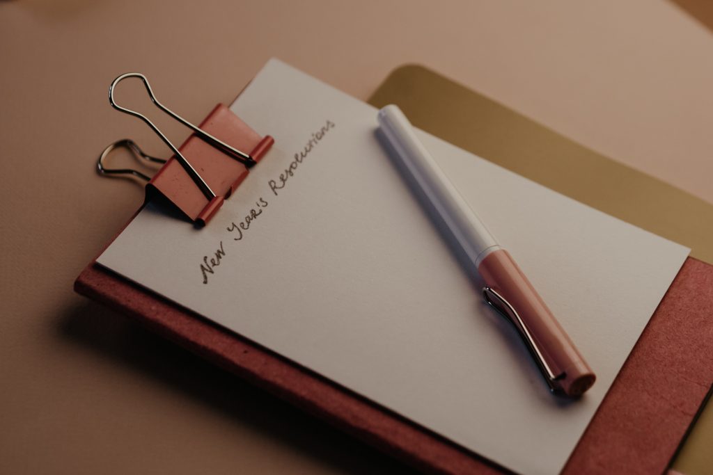 New Year's Resolutions Clip board with new year's resolutions written on it