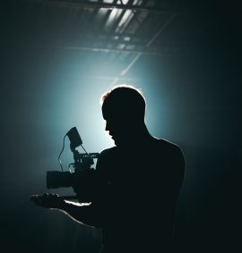 LearnOnline Fast Track Film Studies A level Self-study Silhouette of man with filming camera