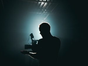LearnOnline Fast Track Film Studies A level Self-study Silhouette of man with filming camera