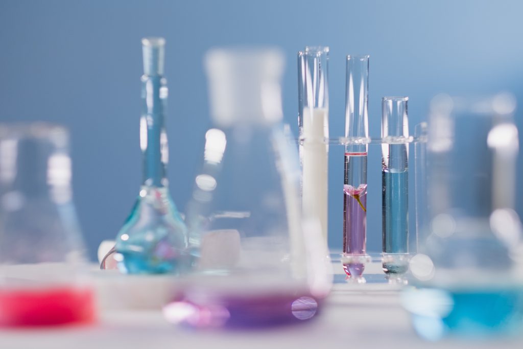 LearnOnline Self-study Chemistry A level - close up of science test tubes and beakers