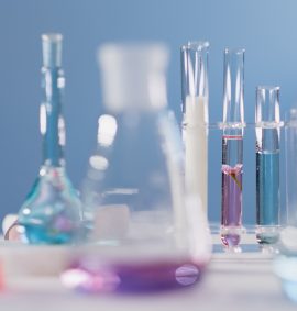 LearnOnline Self-study Chemistry A level - close up of science test tubes and beakers